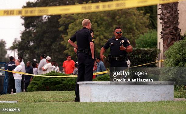 Oxnard Police Officers investigate scene of drive by shooting in the 1400 block of Azalea St. In Oxnard Wednesday afternoon.