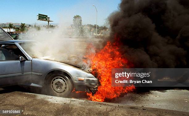 Ventura resident Shelby Leroy Adams' 1986 Nissan 300ZX burns on the side of southbound Highway 101 at Victoria Ave. Adams was driving south on 101...