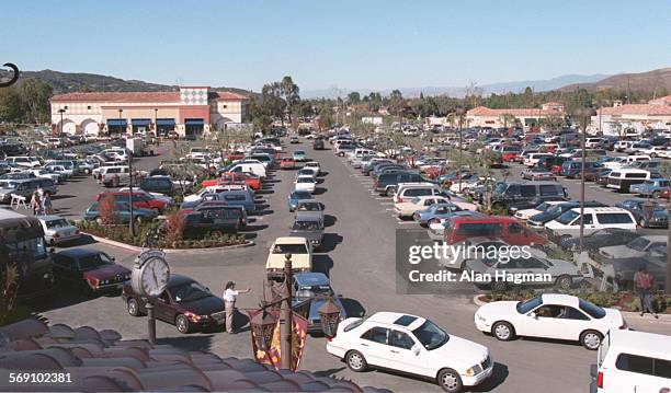 Shoppers flocked to The Promenade in Westlake where it was nearly impossible to find an open parking space Thursday morning during the mall's grand...