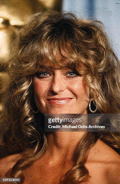 Actress Farrah Fawcett poses backstage during the 52nd Academy Awards at Dorothy Chandler Pavilion in Los Angeles,California.