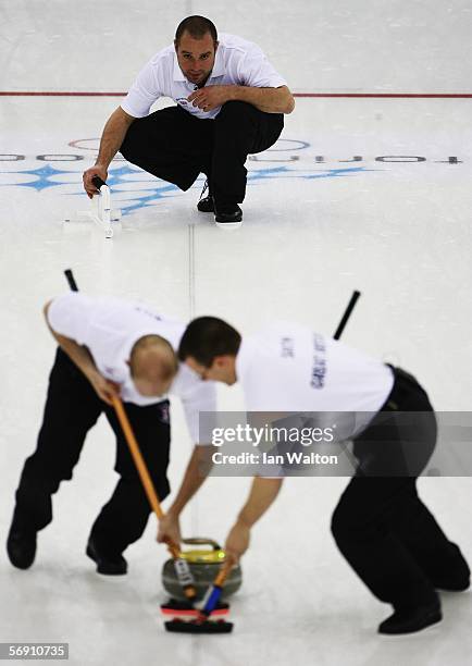 Euan Byers of Great Britain in action during the semi-final of the Men's curling between Finland and Great Britain during Day 12 of the Turin 2006...