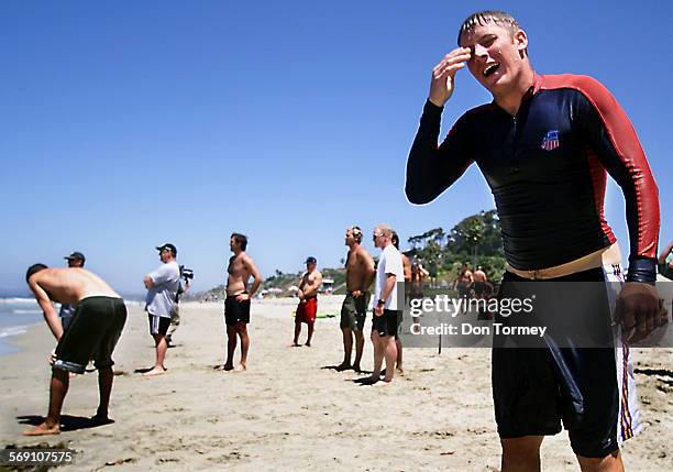 San ClementeMarco Sullivan, of Tahoe City, CA and a member of the U.S. Alpine Ski Team, tries to catch his breath after a running/swimming drill on...