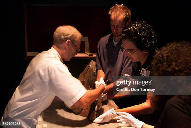 Santa Ana Bowers Museums' Paul Johnson, Director of Exhibits, Dan Rossiter, Chief Preparator, Ivan Abreu, Exhibits Assistant, and Bella Gershovich,...