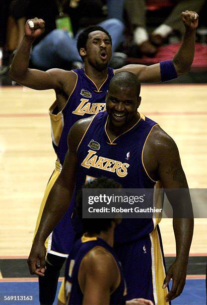 Lakers10.RG  Shaquille O'Neal and Kobe Bryant are all smiles after putting the final nail in the 76ers coffin to win game five of the NBA Finals at...