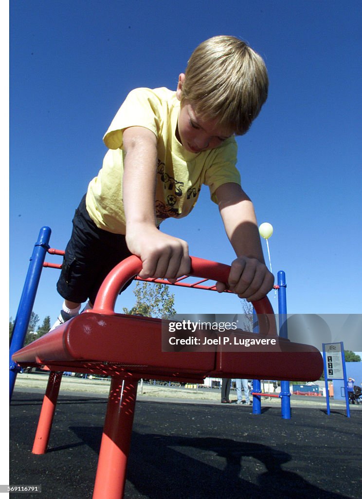 Nine year old Gary Schwartz a 4th grader at Serrania Ave Elementary School in Woodland Hills trys pu