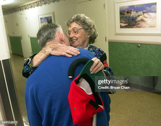 Marcia Flannery greets her son Page Dye at his residence at the Fairview Developmental Center. She and her husband Mike picked him up and spent the...