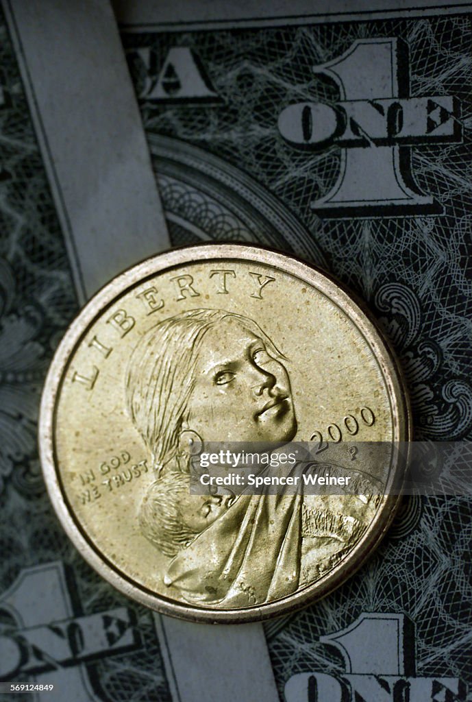 DETAIL of new U.S. Golden Dollar coin. The new dollar coin has the image of Sacagawea (cq), a Shosho