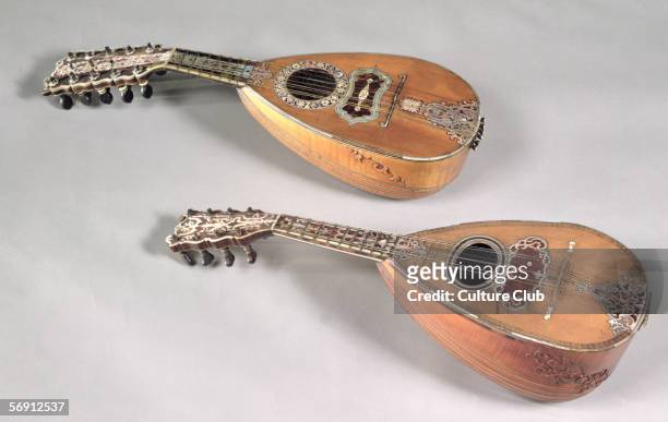 Neapolitan four double stringed mandolin and a Milanese six double stringed mandolin