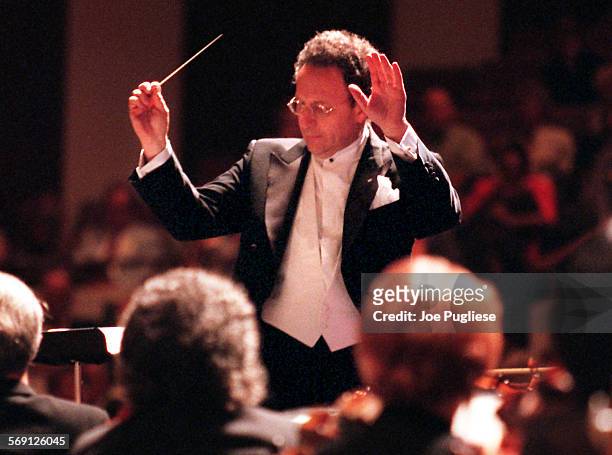 Symphony ends season with finesse. Pg. 33 Music director Boris Brott conducts the New West Symphony during their performance of Exotic Adventures at...