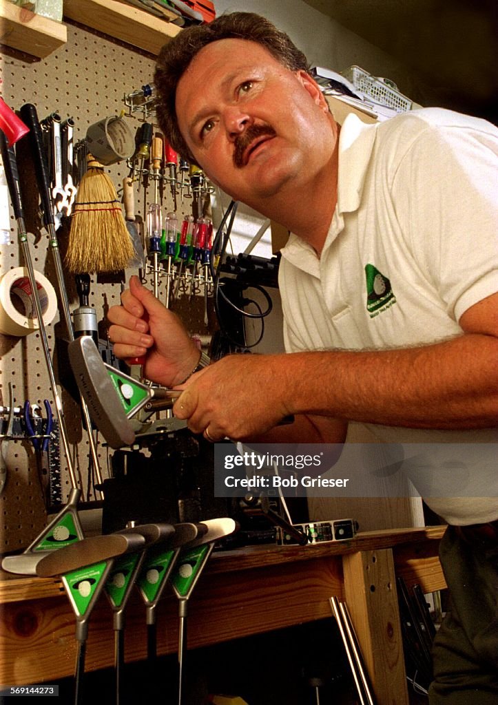 SP.Putter/Pritchett.1/4.BG.3Jul96--Ronnie S. Pritchett in his garage work shop putting the heads of 