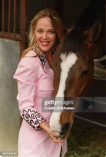 Lewis.hilite.0113.AS.Costa Mesa.Psychotherapist Rebebba Lewis,PHD with Montrachet,a Dutch/Thoroughbredhorse. At Southwest Farms at the Orange...