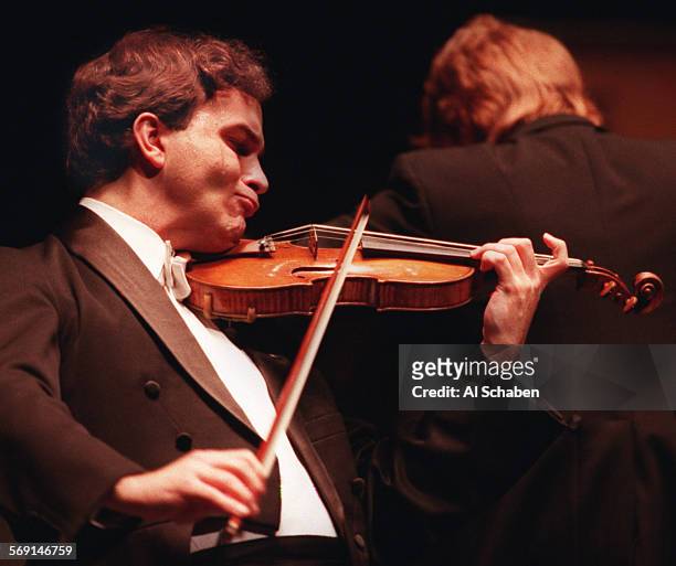 Violin soloist Gil Shaham performs as Hugh Wolff conducts the St. Paul Chamber Orchestra Friday evening at the Orange County Performing Arts Center.