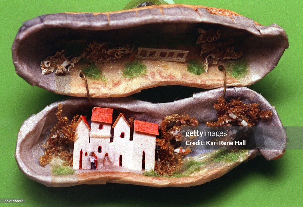 FI.Motts.fleas.KH.10/15/96.Among the collection for Mott's Miniature Museum pieces is this tiny Mexi