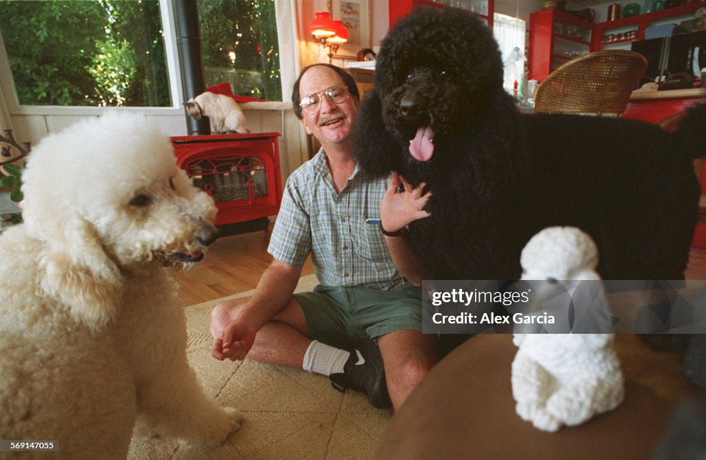 RE.HOUSE SITTER.DOGS..AAGProfessional house sitter Ron Armenta hangs out with dogs at a house in S