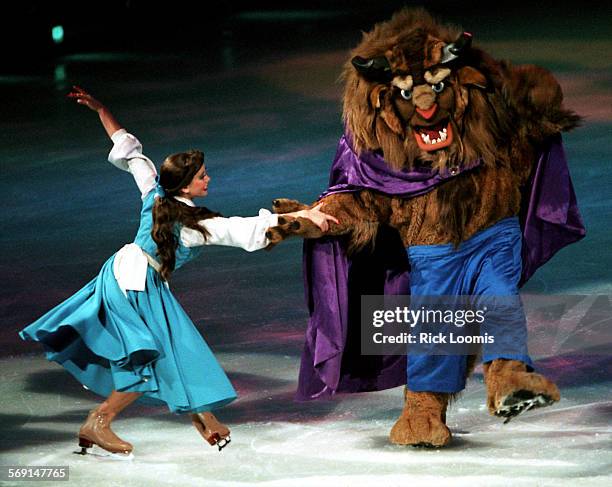 Disney.beast.1226.RLAnaheimNicole BatessonRock as Beauty and Jarrod Koepke as the Beast skate together during Saturday's Disney on Ice production...