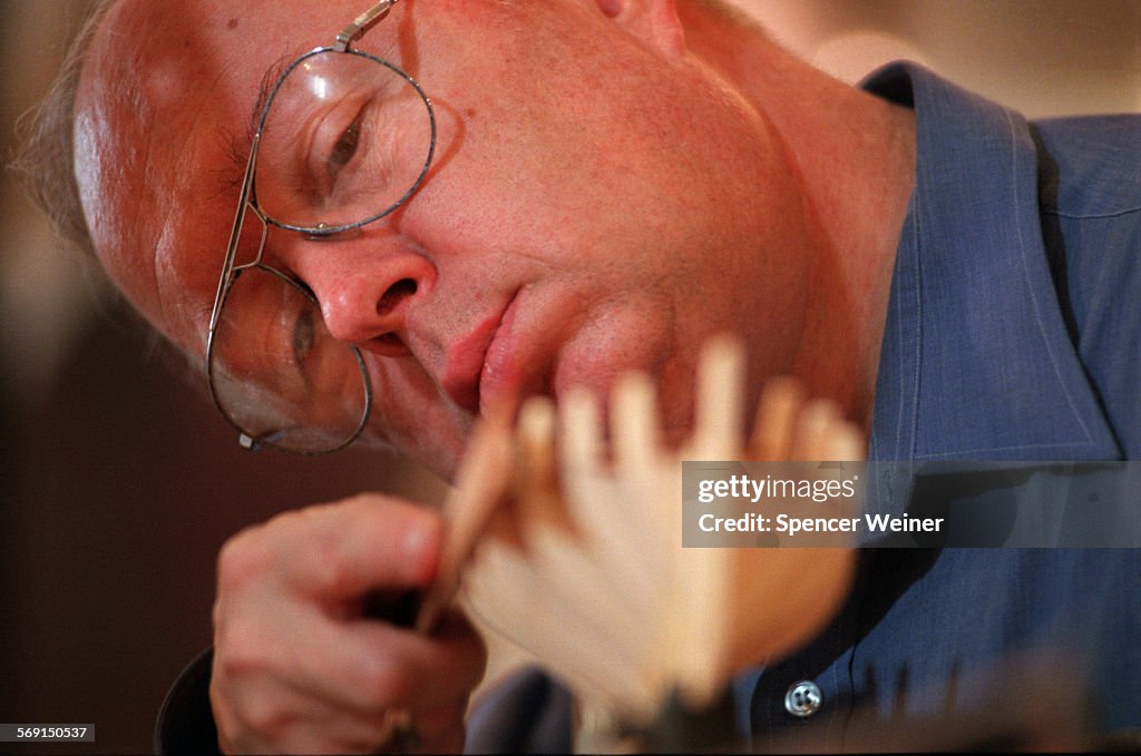 Ventura Maritime Museum Guild member, Richard Walton of Oxnard works on a model ship during model sh