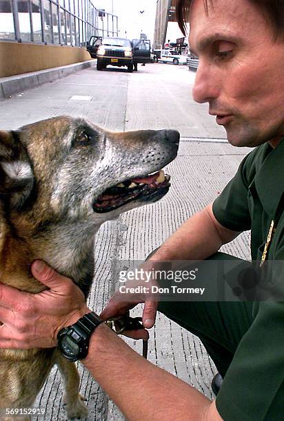 San Onofre CheckpointUS Border Patrol Agent William Kocan, who is the San Diego sector K9 Coordinator/Instructor, with his constant companion...