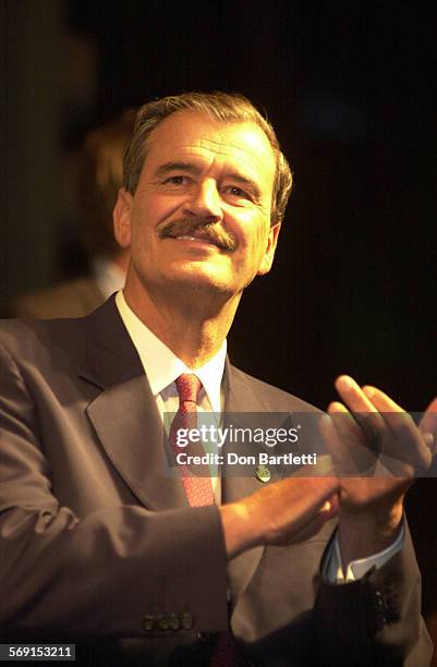 Mexican president Vicente Fox applauds California Governor Gray Davis' comments tonight at the inauguration of the new MexicoCalifornia...