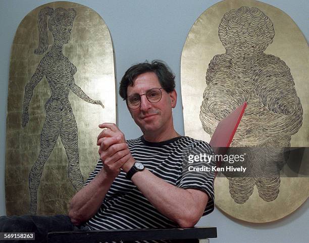 Artist Rick Oginz in his Topanga Canyon home pictured with two of his works of art, "Venus of El Segundo" and Venus of Willendorf." Profile of Oginz,...