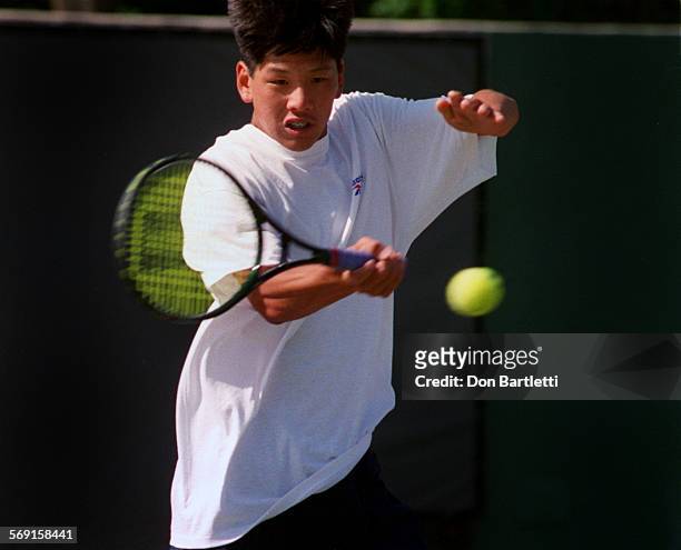 Tennis.Kim2.DB Palm Springs 4/8/95 Kevin Kim one of two tenss who left their O.C. Schools to enroll in the Palmer Tennis Academy in Florida....