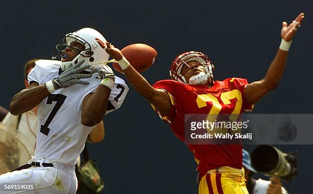 Usc1.WS USC cornerback Darrell Rideaux deflects a pass intended for Penn St. Receiver Bryant Johnson in the first quater of the Kickoff Classic in...