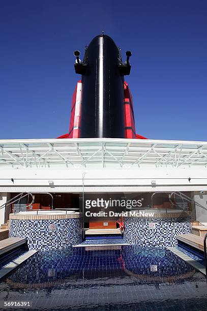 An upper deck swimming pool area is seen aboard the Queen Mary 2 Commodore Warwick cruise ship on its maiden call to the Port of Los Angeles February...