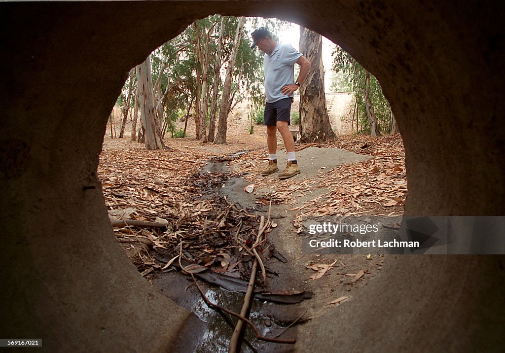 ME.Lake.Drain.RDL (kodak) (8/7/97) George Marenko, maintenance supervisor for the Lake forest commun