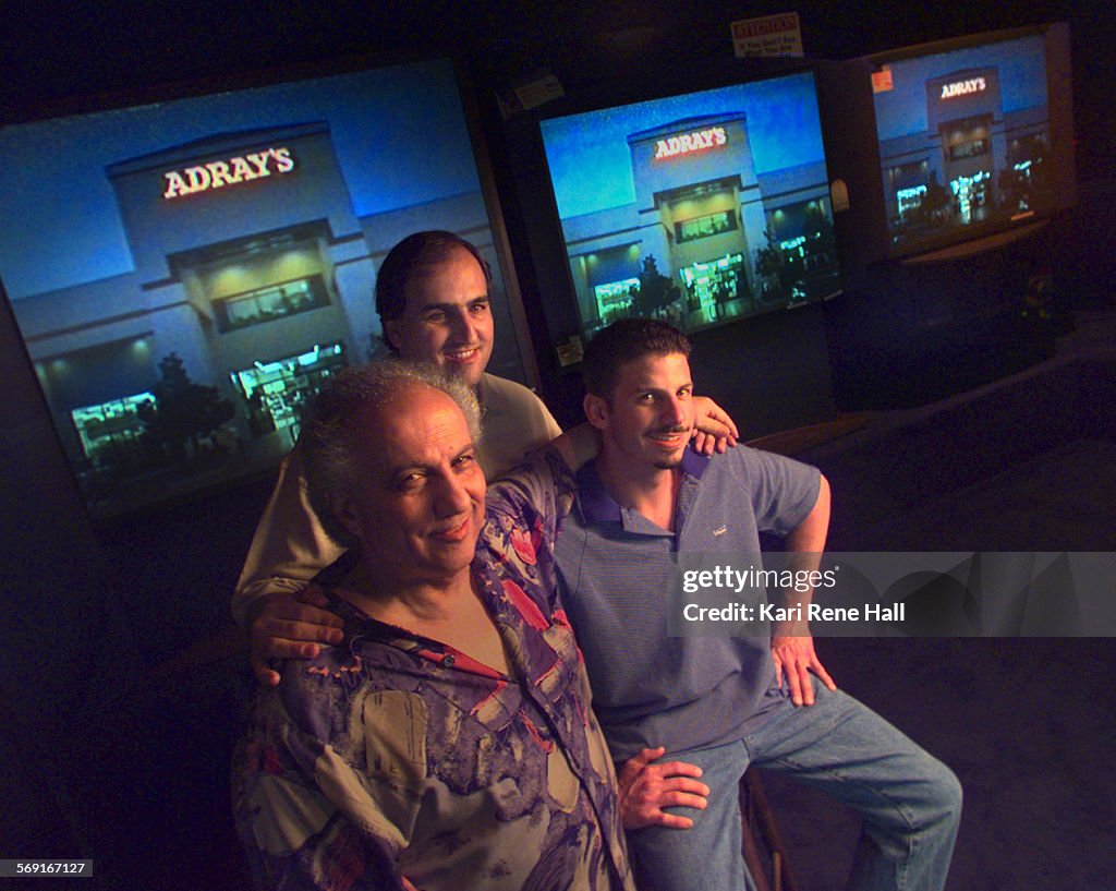 FI.Adray.screens1.KRH.6/4/97.Lou Adray, president of Adray's in Orange, (left to right) with his son