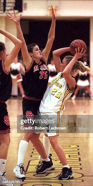 Basketball.Defense.RDL 2/10/98 Basketball: San Clemente High School at Capristrano Valley High School. Colleen Turnbull plays tough defense on Leah...