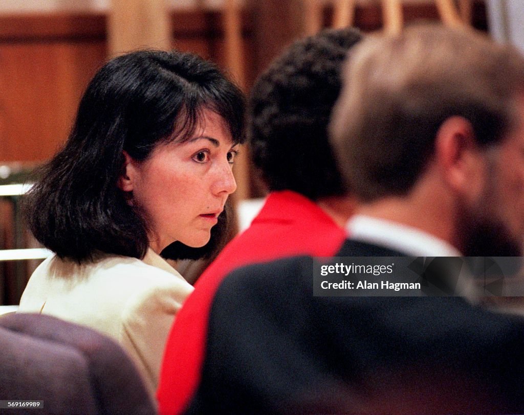 970918 (Ventura)  Diana Haun  PHOTOGRAPHER: Media Pool Photograph Diana Haun listens to procec