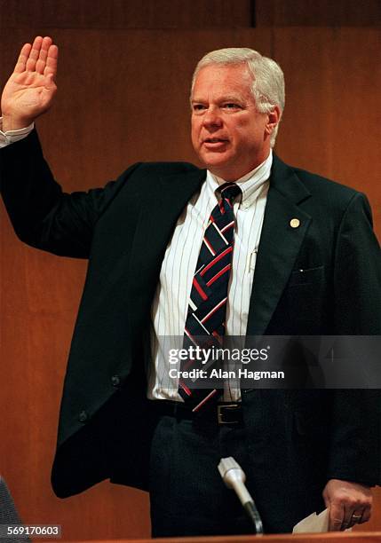 Ventura County District Attorney Michael Bradbury raises his hand to be sworn for evidentiary hearing in superior court Thursday morning. The hearing...