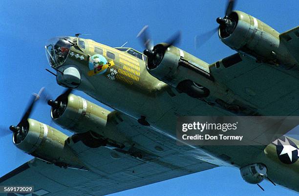 17Sky.05/05/97.DTThe vintage World War II B17 'Flying Fortress' the NineONine in flight over the Pacific Ocean over Orange County en route to...