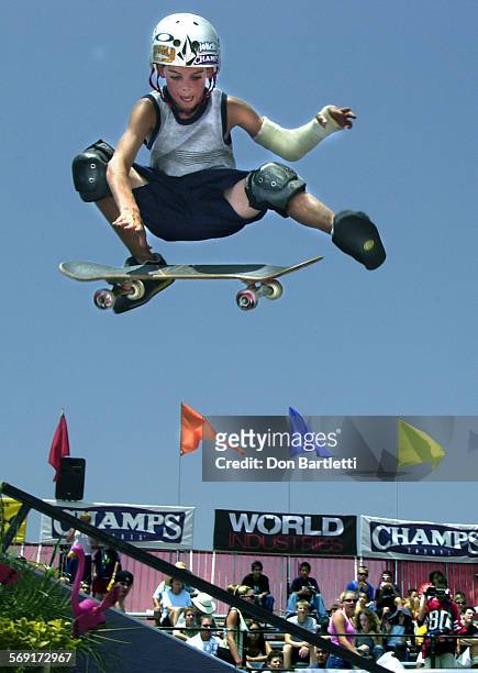 Yearold skateboarder Ryan Sheckler of San Clemente soars above the crowd during a practice session on the "street course" at the U.S. Open of...