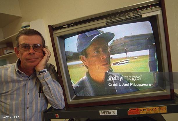 Brown.1.0313.JPLThousand oaks girls basketball coach Chuck Brown with the TV commercial he is in on the screen. He appeared in the latest Energizer...