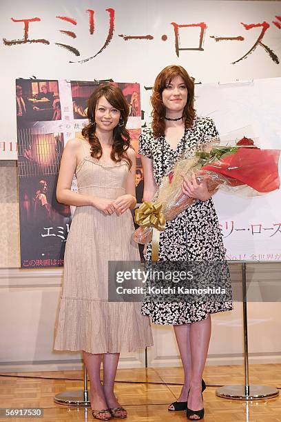 Actress Jennifer Carpenter and Henmi Emiri attend a press conference promoting the film "The Exorcism of Emily Rose" at a Tokyo hotel on February 23,...