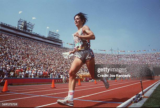 Joan Benoit comes into the Coliseum to run the last portion of the Women's marathon on the track at the Olympic Games in Los Angeles. She won the...
