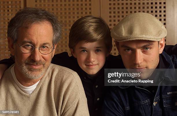 Director Steven Spielberg, actors Haley Joel Osment and Jude Law are photographed for Los Angeles Times at L'Ermitage Hotel on April 22, 2001 on...