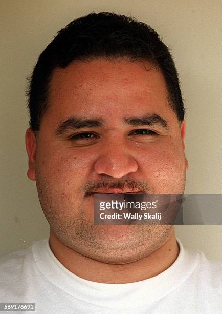 Photo of Jose Munoz who is struaggling as a security guard in Los Angeles' service economy. He graduated from Belmont High School ten years ago.
