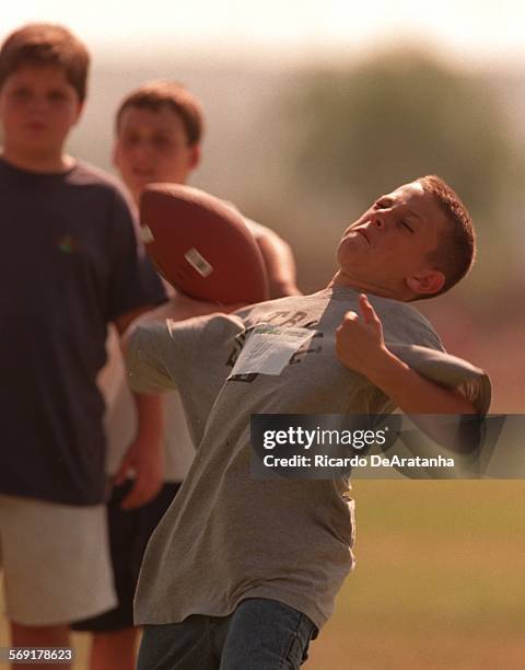 Frenzy.2.1101.RD  Lakeview Terrace, CA  Andrew Baslow of Northridge, about to through the football in a passing competition, during the annual...