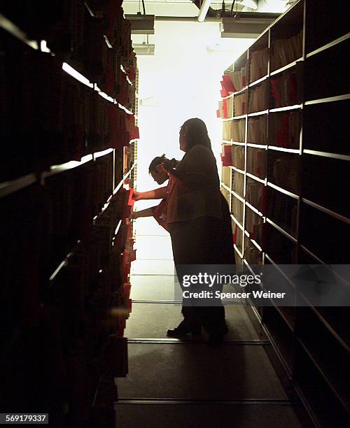 Ventura County Superior Court records clerks labor in semidarkness for the second day in a row, Tuesday at the Ventura County Government Center.