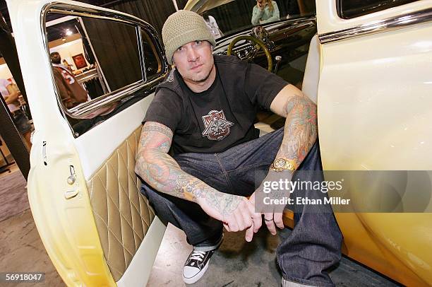 Jesse James, founder of West Coast Choppers poses in a 1954 Chevrolet at the MAGIC convention held ar the Las Vegas Convention Center February 22,...