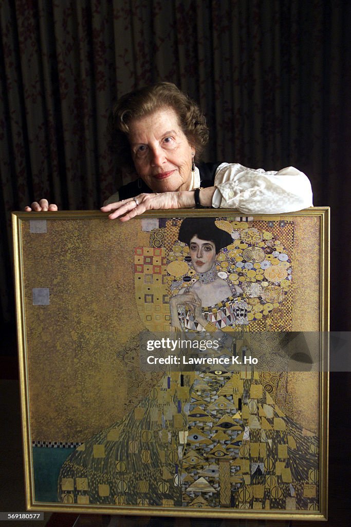 026195.ME.0309.NAZIS.3.LH. Maria Altmann, the niece of Adele Bloch–Bauer with a reproduction of one