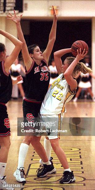 Basketball.Defense.RDL 2/10/98 Basketball: San Clemente High School at Capristrano Valley High School. Colleen Turnbull plays tough defense on Leah...