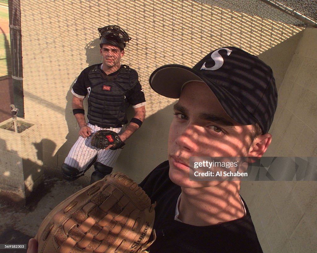 S.baseball.prepcover.0225.ASANAHEIMServite High School pitcher Brian Wolfe, right, and catcher R