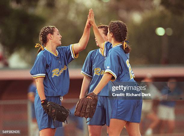 Quartz.1.Rd.6598 Lakewood: Mayfair ParkDivision II Finals: Another "K" ! Quartz Hill pitcher, left, Jodie Cox gets high fives from Andrea...