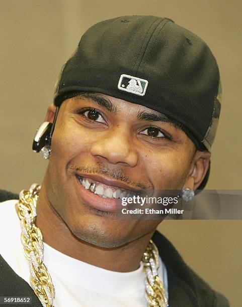 Rapper Nelly smiles during a news conference at the MAGIC convention at the Las Vegas Convention Center February 22, 2006 in Las Vegas, Nevada. Nelly...