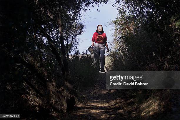 Linda Palmer , of the Santa Monica Mountains Trails Council, works with other volunteers to rebuild and restore hiking trails in the Santa Monica...