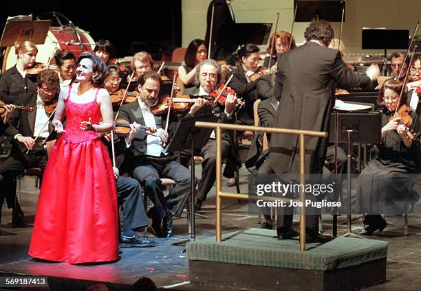 Mezzo soprano Layna Chianakas sings as music director Boris Brott conducts the New West Symphony during their performance of Exotic Adventures at the...