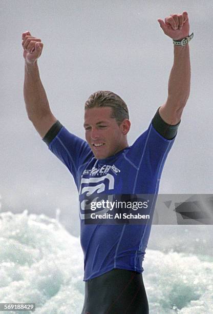 Andy Irons, of Hawaii, celebrates his win over Jake Patterson, of Australia in the final round of the Billabong Pro Saturday at Lower Trestles.