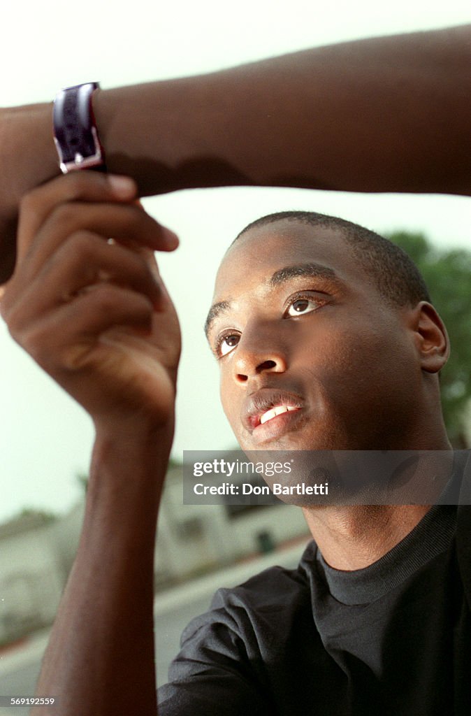 SP.Smith.Watch.DB.9/4/96.Tustin. Daniel Smith, one of the top county cross country runners, sets his